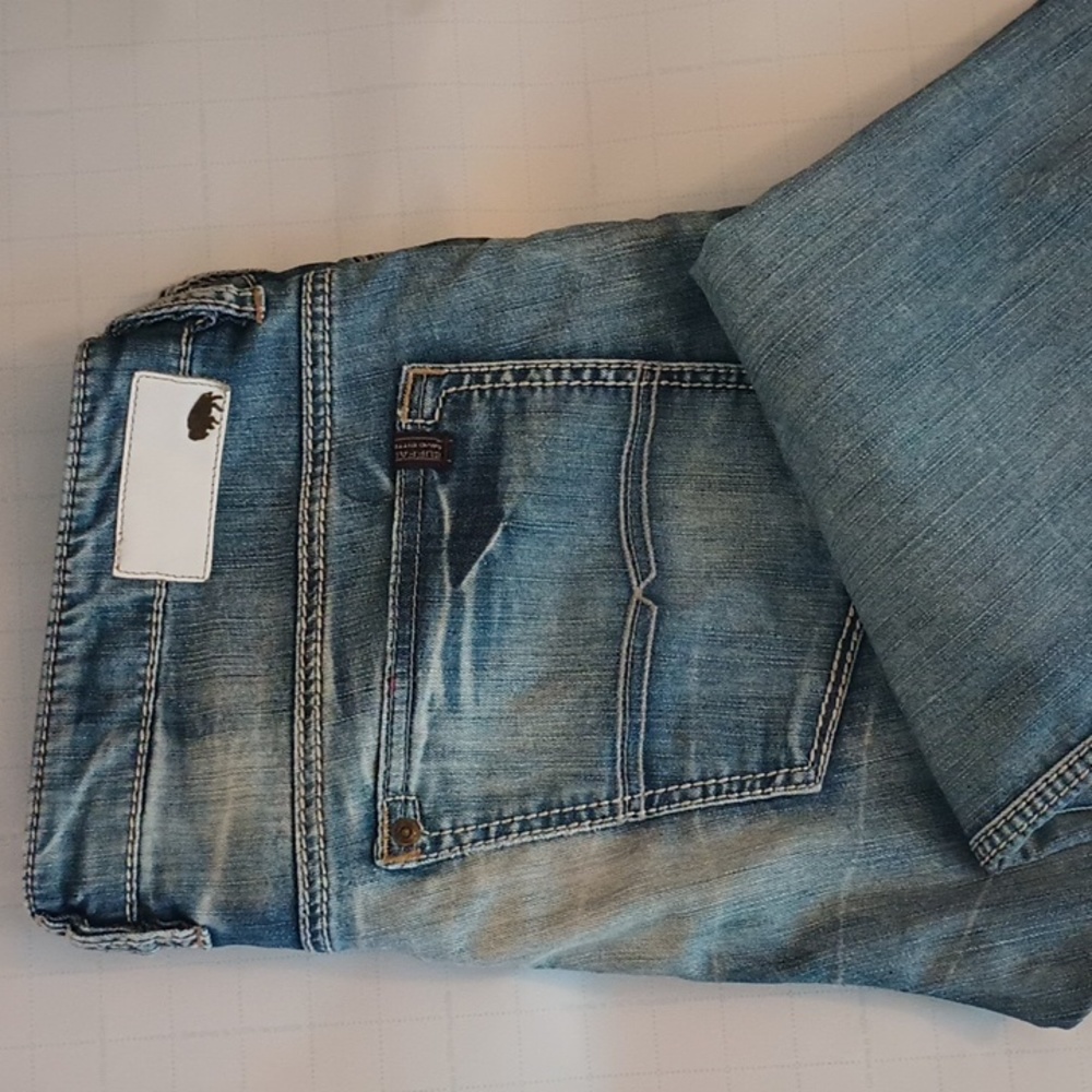 Buffalo button fly blue denim slacks ( 38x32 )by David Bitton